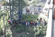 Buscan a motorista que cayó al río Isabela tras accidente múltiple en Villa Mella