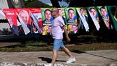 Lula y Flávio Bolsonaro juegan al vale todo en inciertas elecciones en Brasil